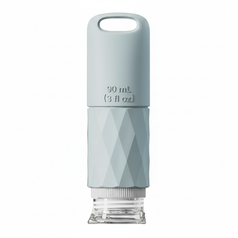 Grey-blue silicone travel squeeze bottle 90ml with diamond grip and loop handle on white background – main product image